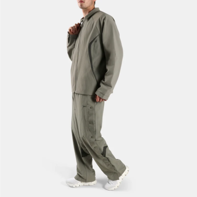 CONJUNTO DEPORTIVO REEBOK - CAMPERA Y PANTALON GRIS